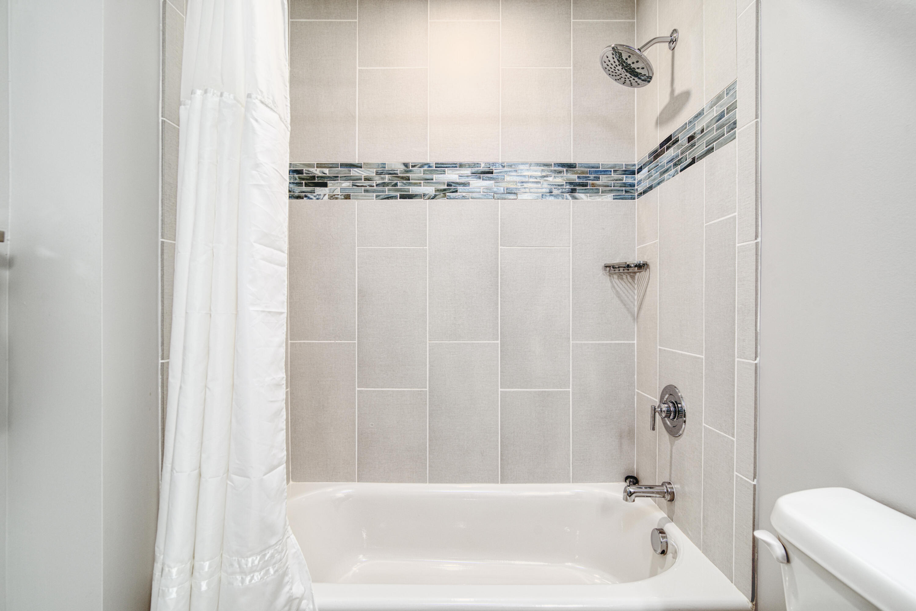 9000 Heron Walk Drive, Unit 3204 Miramar Beach, FL 32550 - Photo 29 of 45 a bathroom with a bathtub and a shower