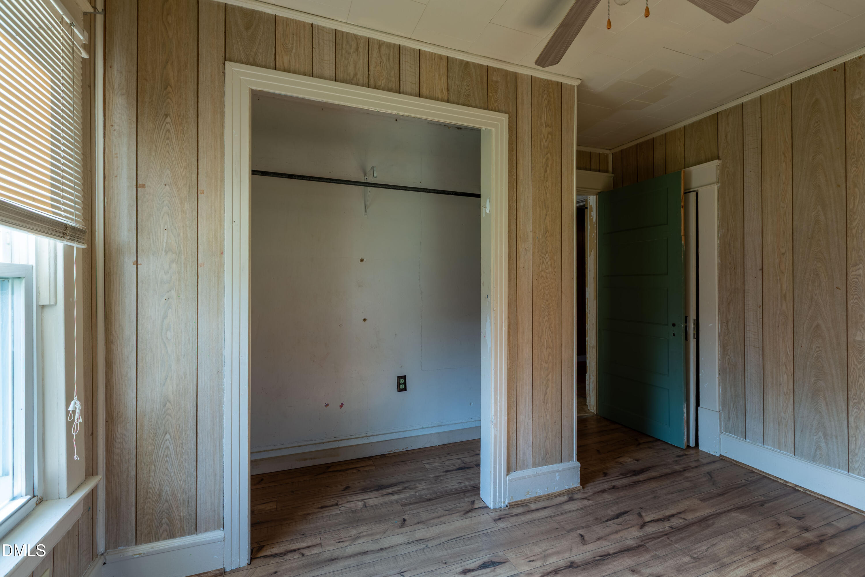 4295 Virgilina Road Roxboro, NC 27574 - Photo 8 of 46 an empty room with wooden floor
