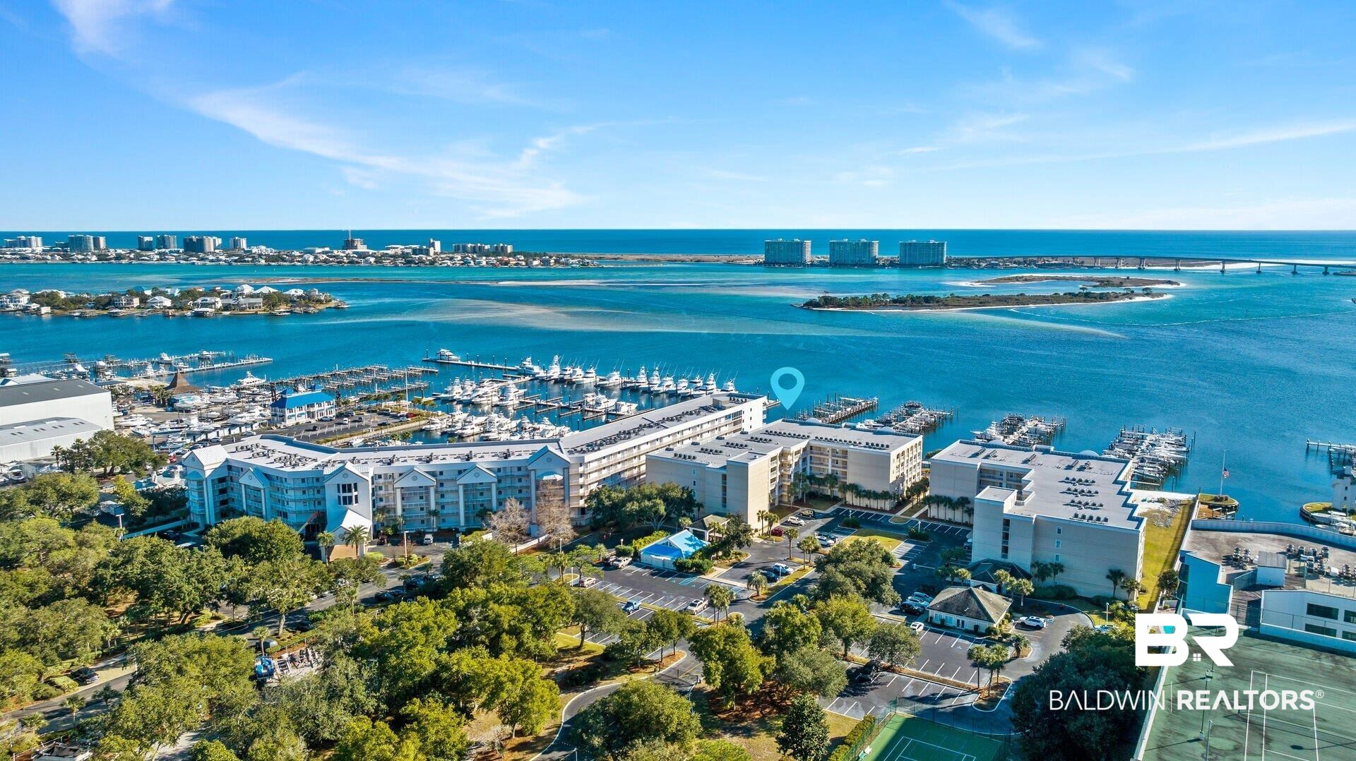 27770 Canal Road, Unit 2502 Orange Beach, AL 36561 - Photo 45 of 55 View of urban area featuring a marina and a large body of water