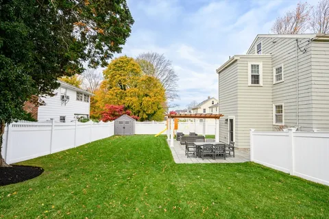 a garden view with a seating space