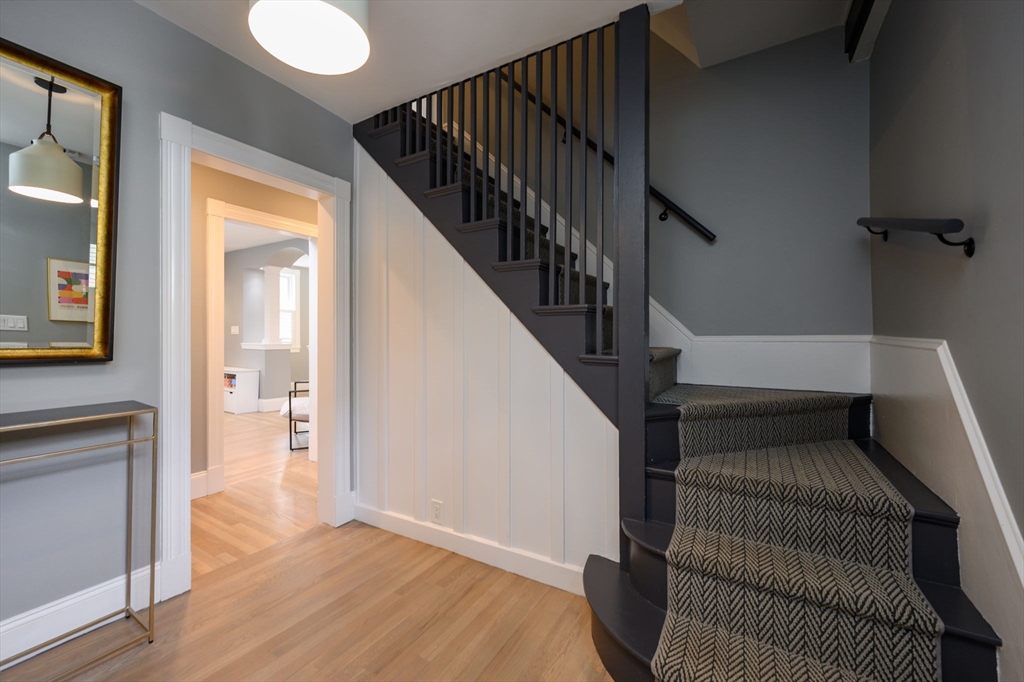 651 Canton Avenue Milton, MA 02186 - Photo 4 of 42 a view of entryway and hall with wooden floor