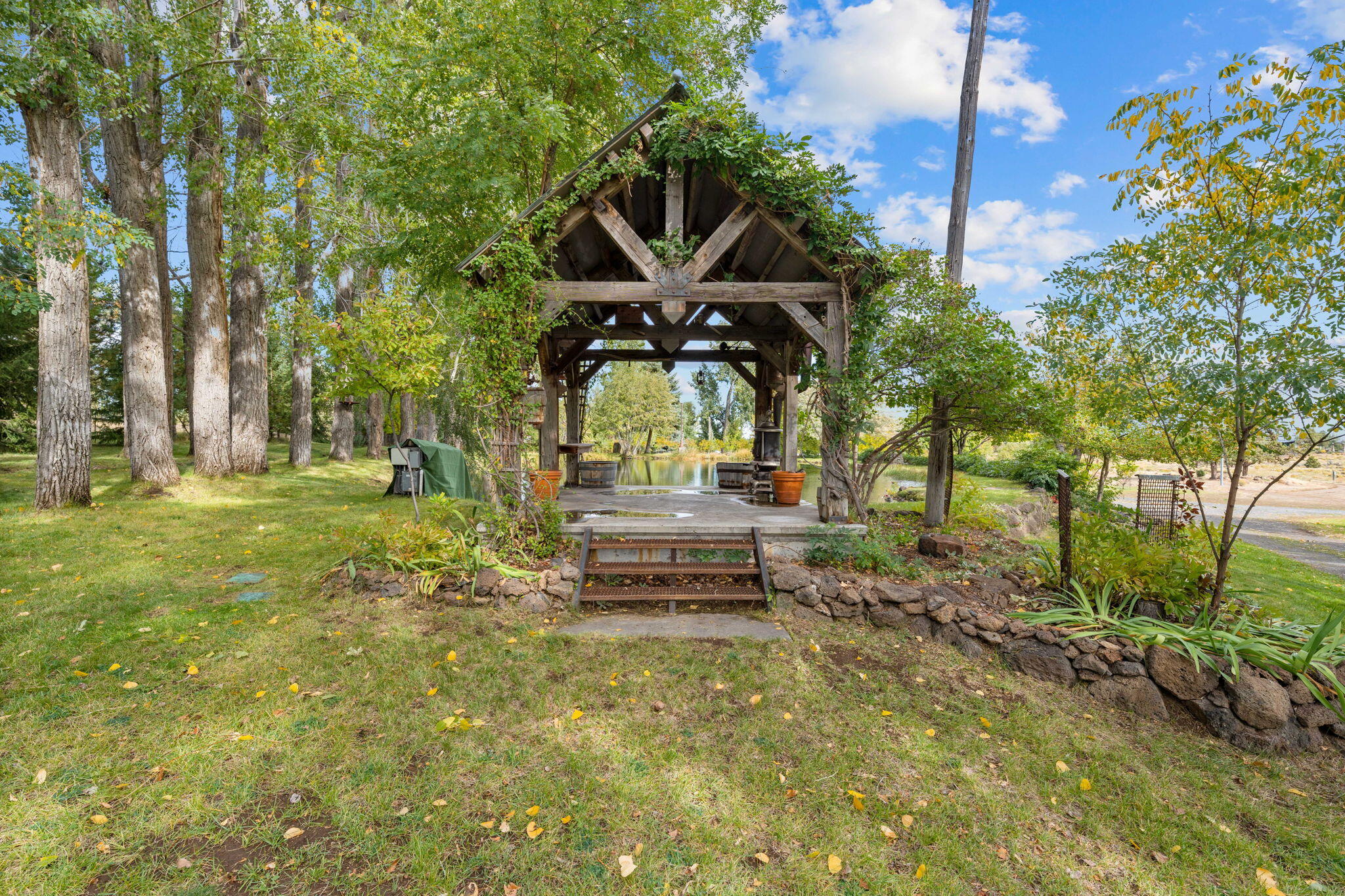 21925 Bear Creek Road Bend, OR 97702 - Photo 61 of 104 a house view with a garden space