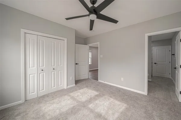 a bathroom with a sink toilet and vanity
