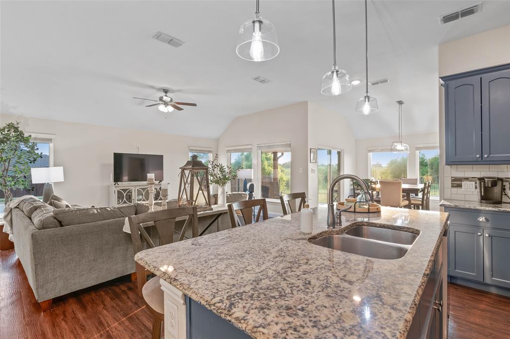 Open floor plan kitchen and living area with great natural light