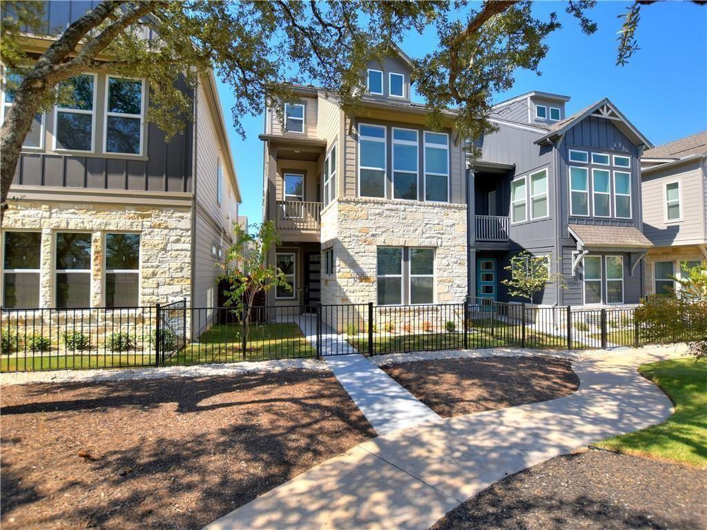 13611 Terrett Trace, Unit 108 Austin, TX 78717 - Photo 1 of 33 a view of a house with a yard and balcony