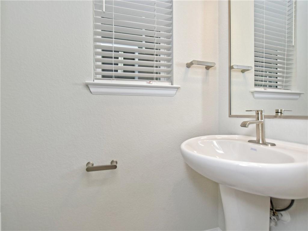 13611 Terrett Trace, Unit 108 Austin, TX 78717 - Photo 17 of 33 a bathroom with a sink and a window