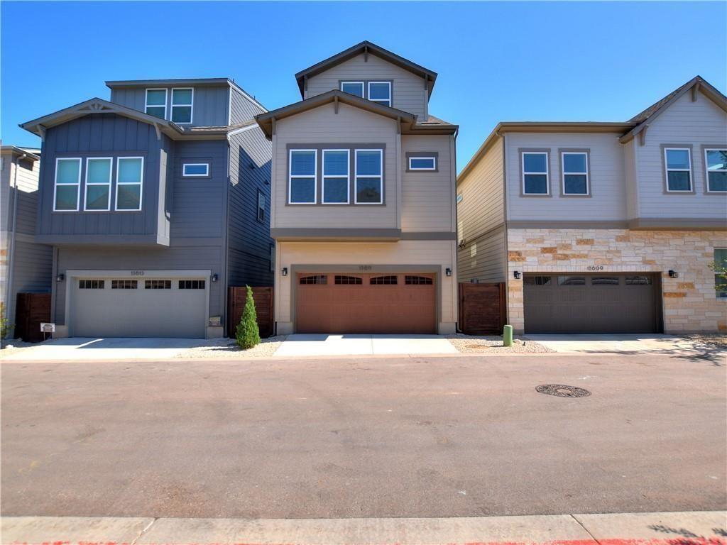 13611 Terrett Trace, Unit 108 Austin, TX 78717 - Photo 27 of 33 a front view of a house with yard