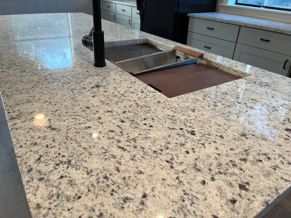 3505 Lone Man Mountain Road, Unit A Wimberley, TX 78676 - Photo 7 of 11 Premium granite counters define this kitchen's elegant and functional design.