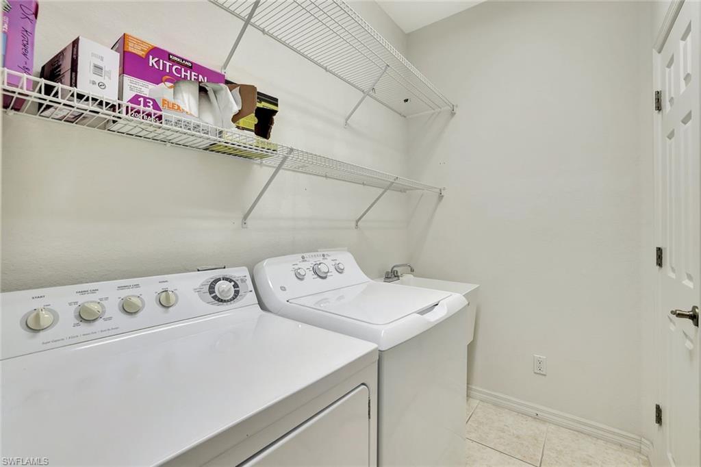 3617 Recreation Lane Naples, FL 34116 - Photo 21 of 25 a utility room with dryer and washer