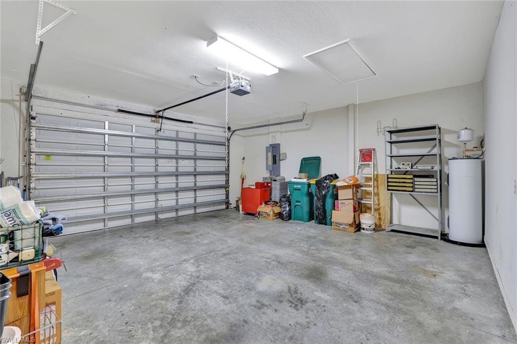 3617 Recreation Lane Naples, FL 34116 - Photo 25 of 25 a view of a garage with rack and bicycle