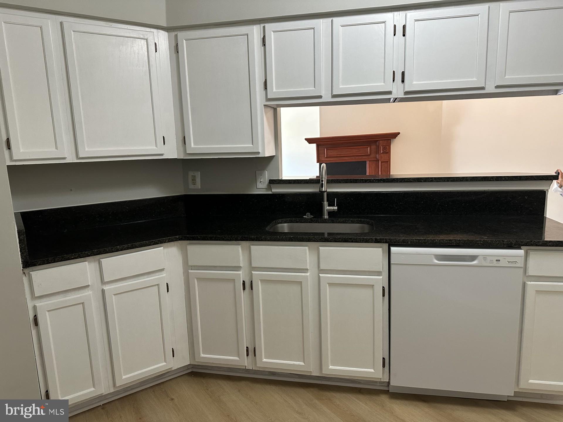 7859 Apache Ridge Court Manassas, VA 20109 - Photo 10 of 27 a close view of a stove and cabinets