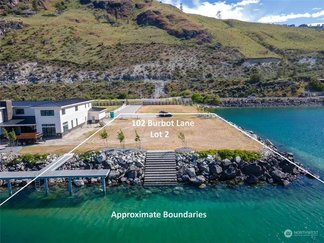 an aerial view of a house with a garden