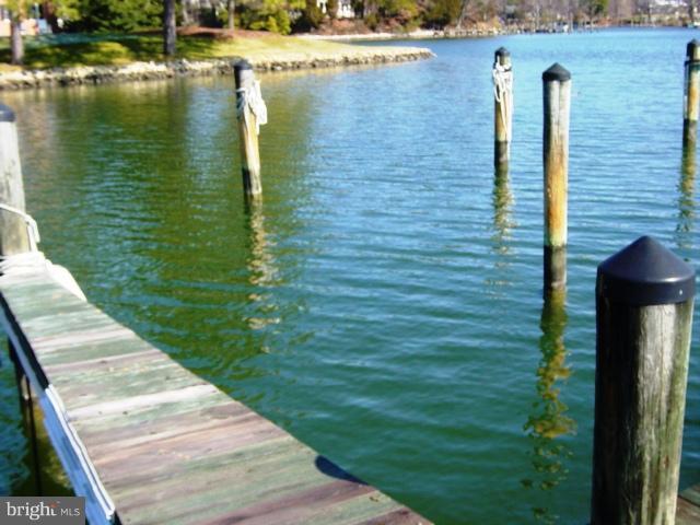 702 Runabout Loop, Unit V10 Solomons, MD 20688 - Photo 18 of 30 a view of a lake from a balcony