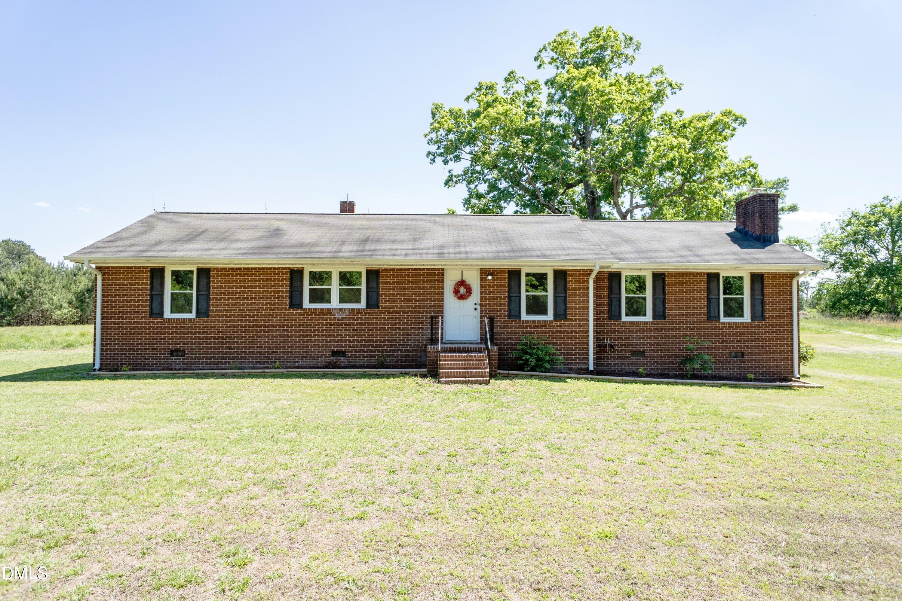 641 Rocky Ford Road Louisburg, NC 27549 - Photo 32 of 38 a house that has a big yard