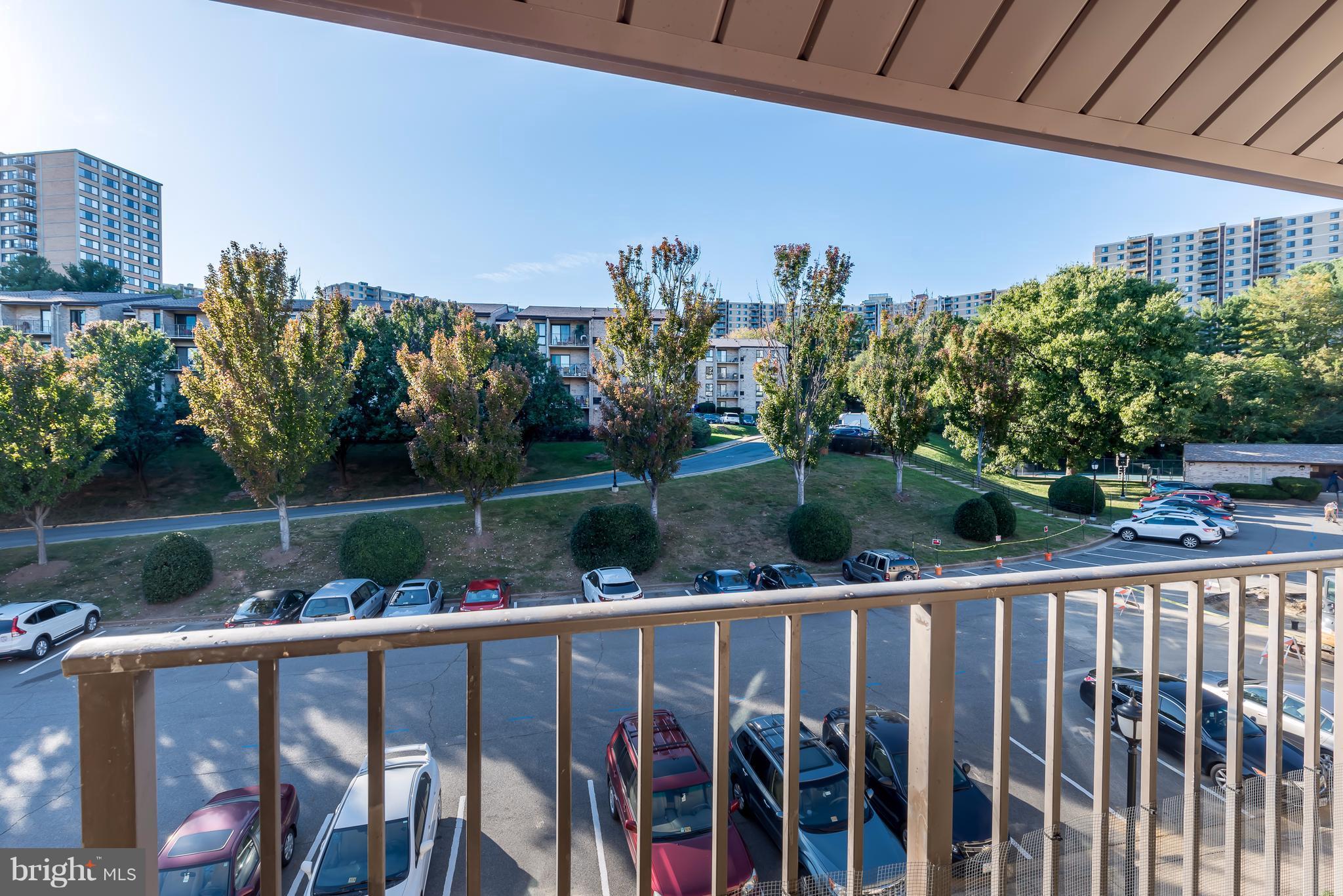 6137 Edsall Road, Unit O Alexandria, VA 22304 - Photo 1 of 13 a view of a lake from a balcony