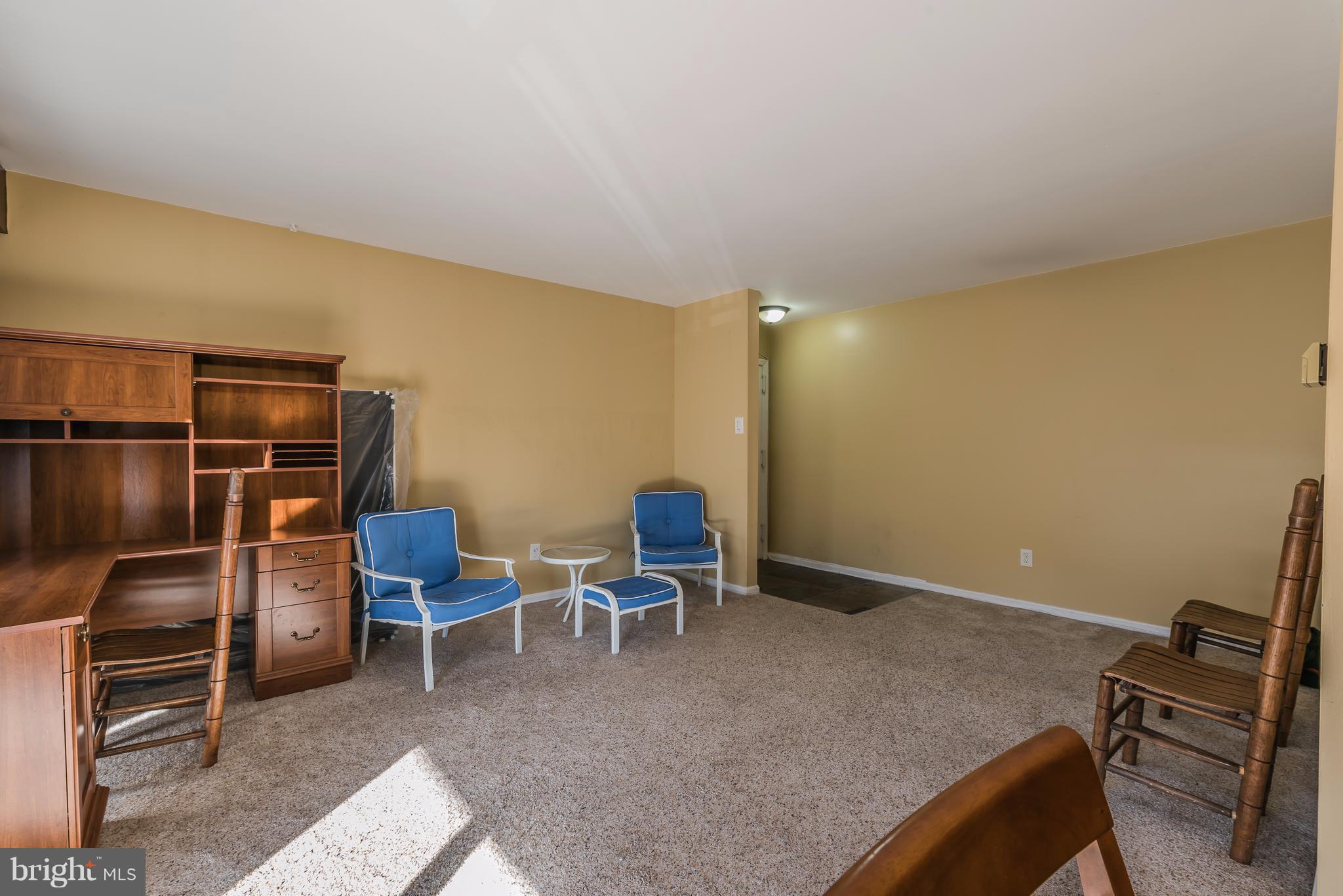 6137 Edsall Road, Unit O Alexandria, VA 22304 - Photo 4 of 13 a view of a room with chairs