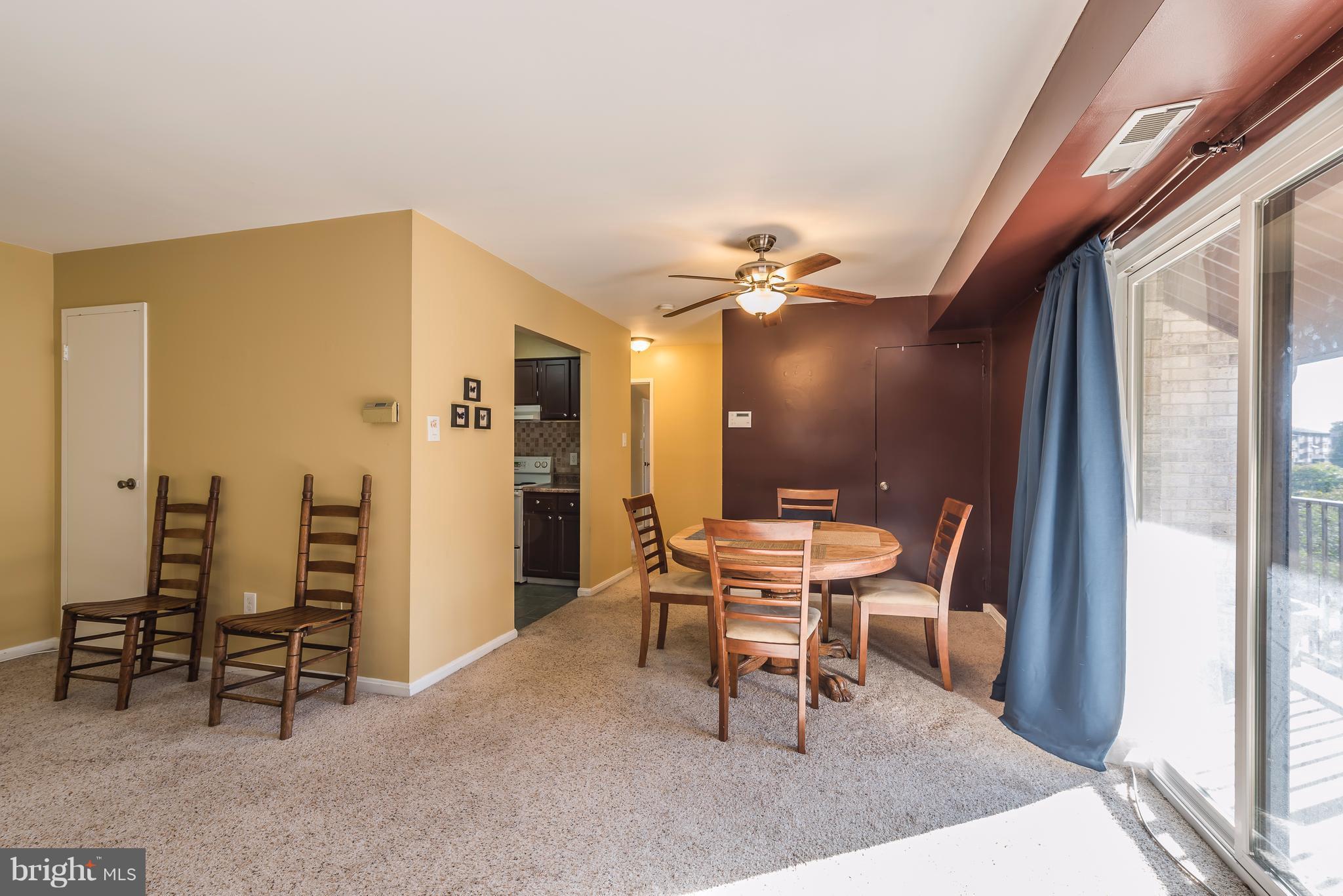 6137 Edsall Road, Unit O Alexandria, VA 22304 - Photo 5 of 13 a view of a livingroom with furniture and a window