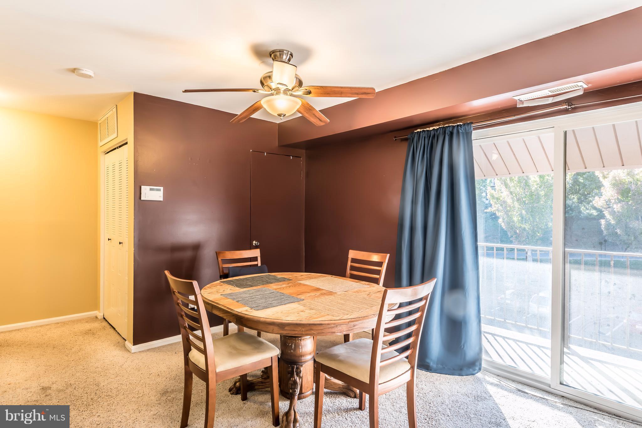6137 Edsall Road, Unit O Alexandria, VA 22304 - Photo 6 of 13 a view of a dining room with furniture window and outside view