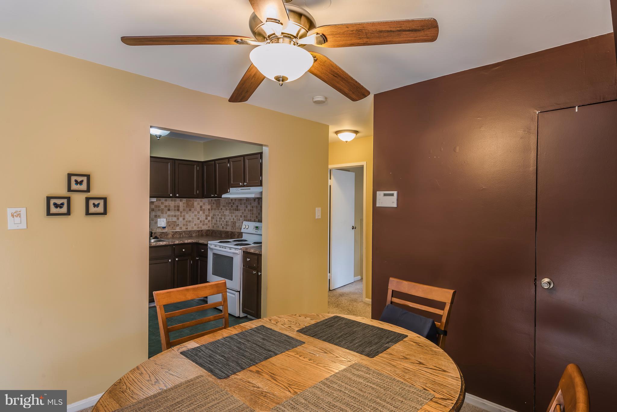 6137 Edsall Road, Unit O Alexandria, VA 22304 - Photo 7 of 13 a bedroom with a bed and a television