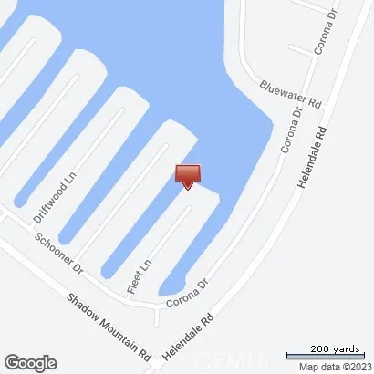 a view of a large body of water with a building in the background