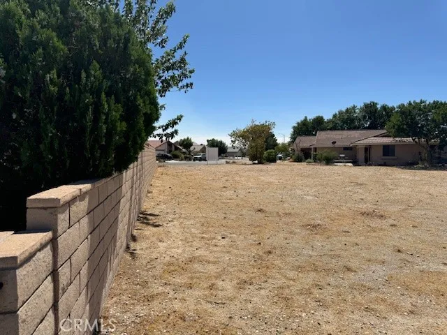 a view of outdoor space and car parked
