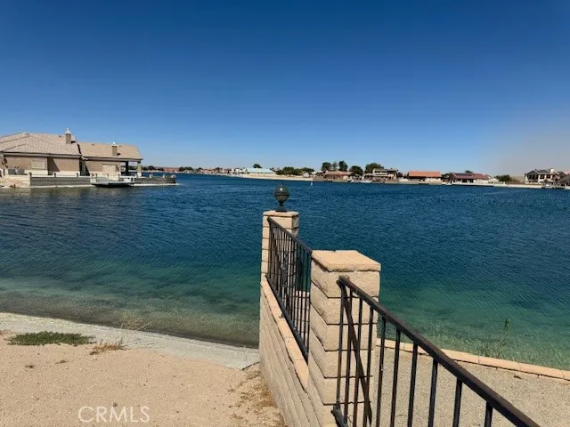 a view of a lake from a balcony