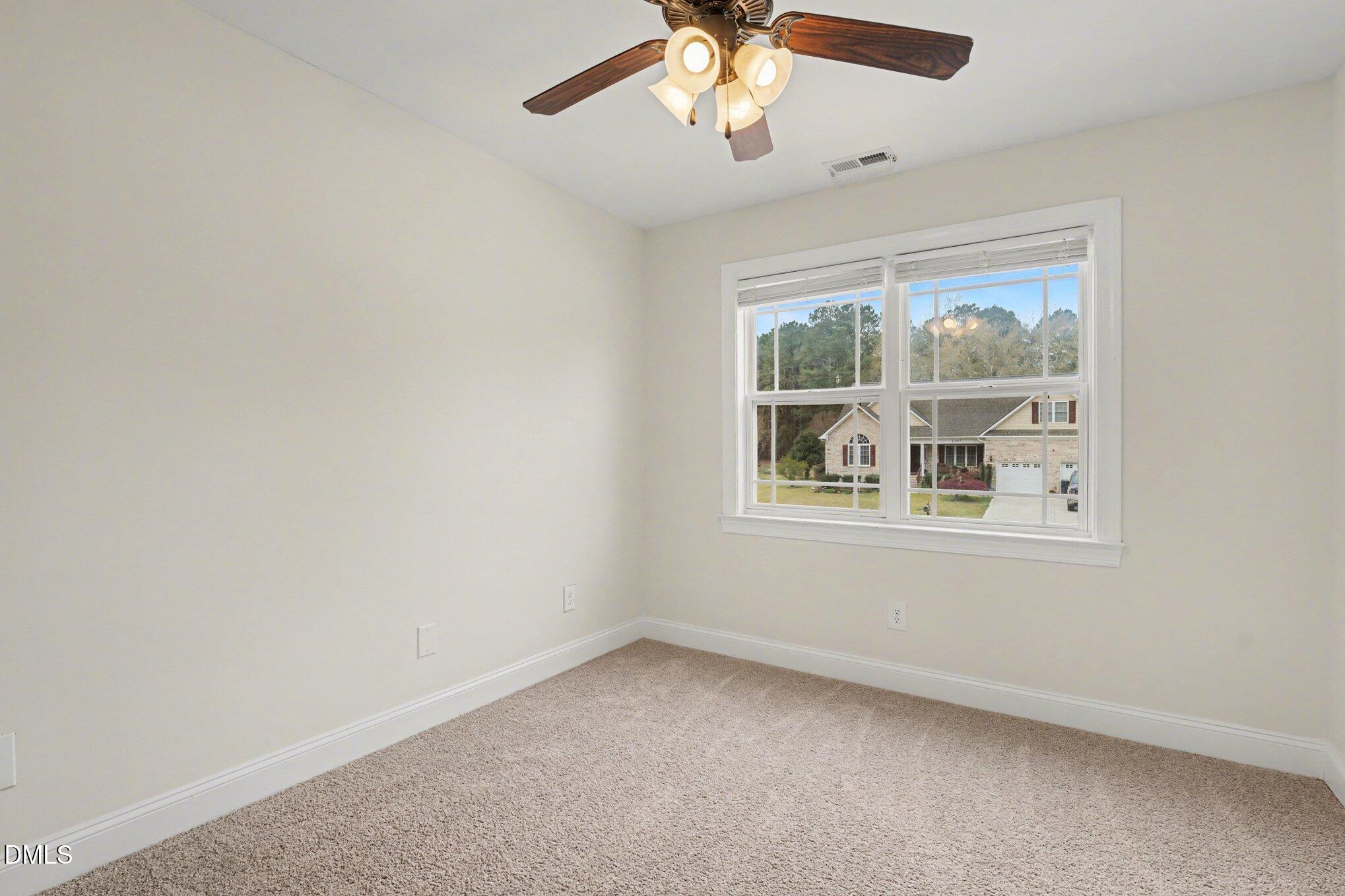 7250 Sandcastle Lane Linden, NC 28356 - Photo 15 of 20 an empty room with a window