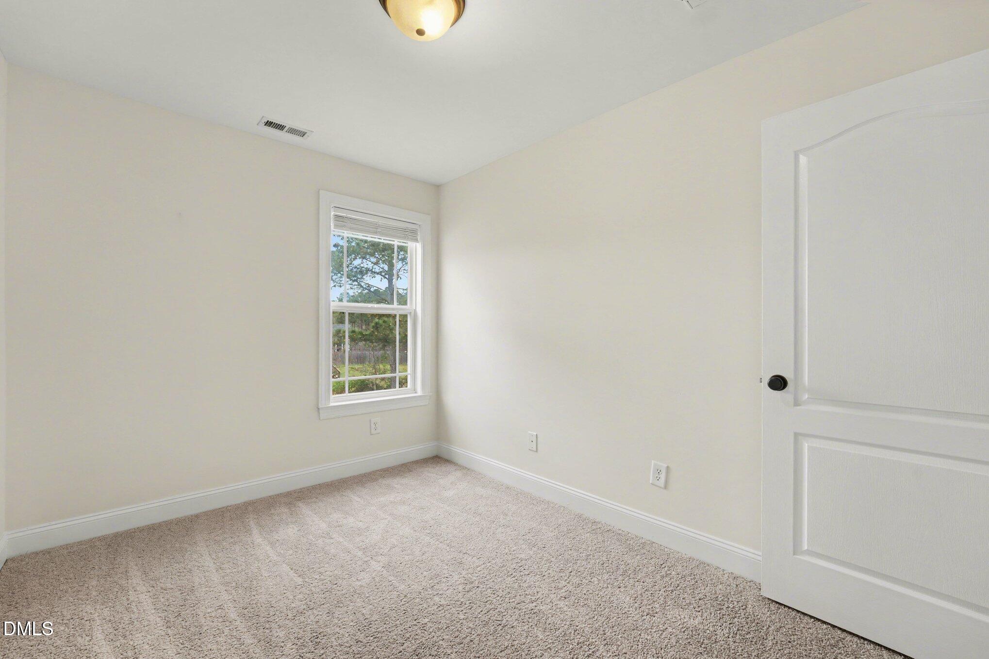 7250 Sandcastle Lane Linden, NC 28356 - Photo 18 of 20 an empty room with a window