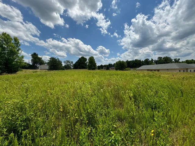 a view of a building with a street