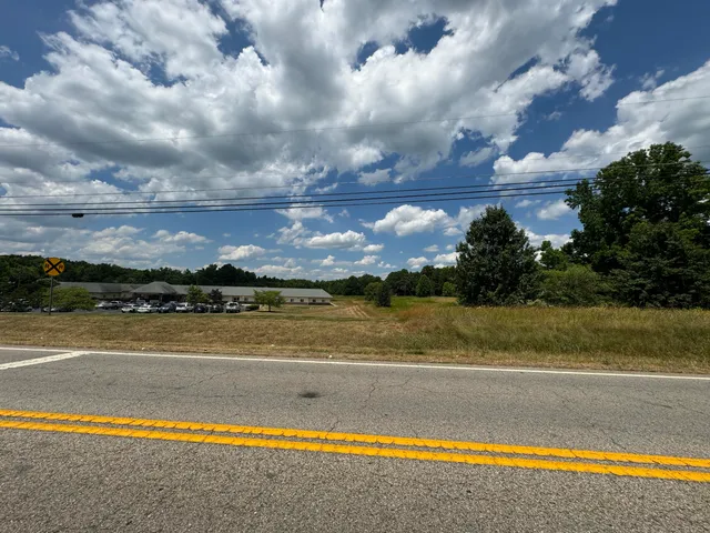 a view of a field with an outdoor space