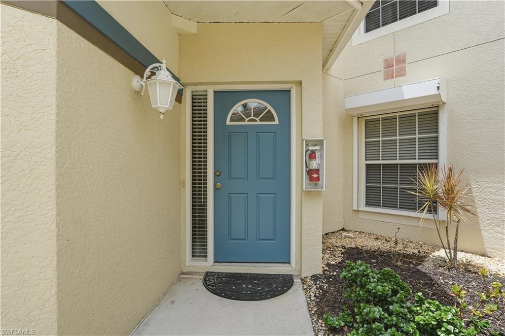 10871 Crooked River Road, Unit 202 Estero, FL 34135 - Photo 33 of 46 a view of front door of house