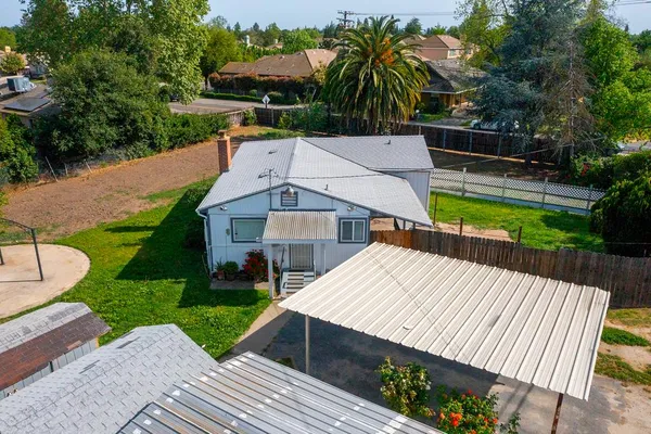 a view of a backyard with a garden
