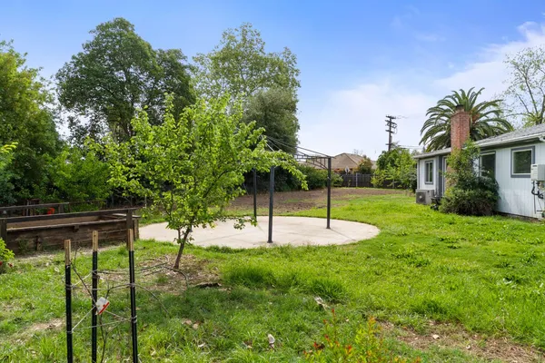 a backyard of a house with lots of green space