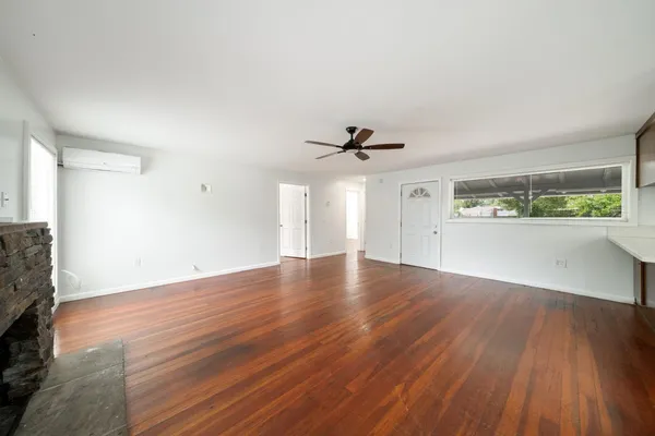 a kitchen with stainless steel appliances a refrigerator and a stove top oven