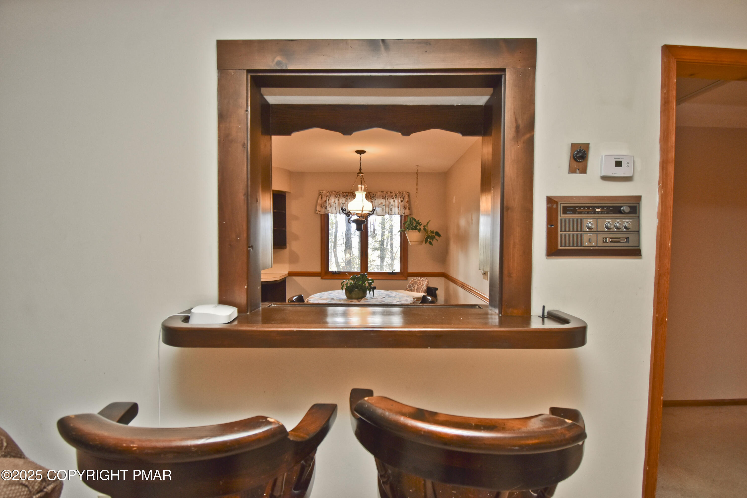 5294 Cherry Valley Road Saylorsburg, PA 18353 - Photo 14 of 53 a room with a table and chairs