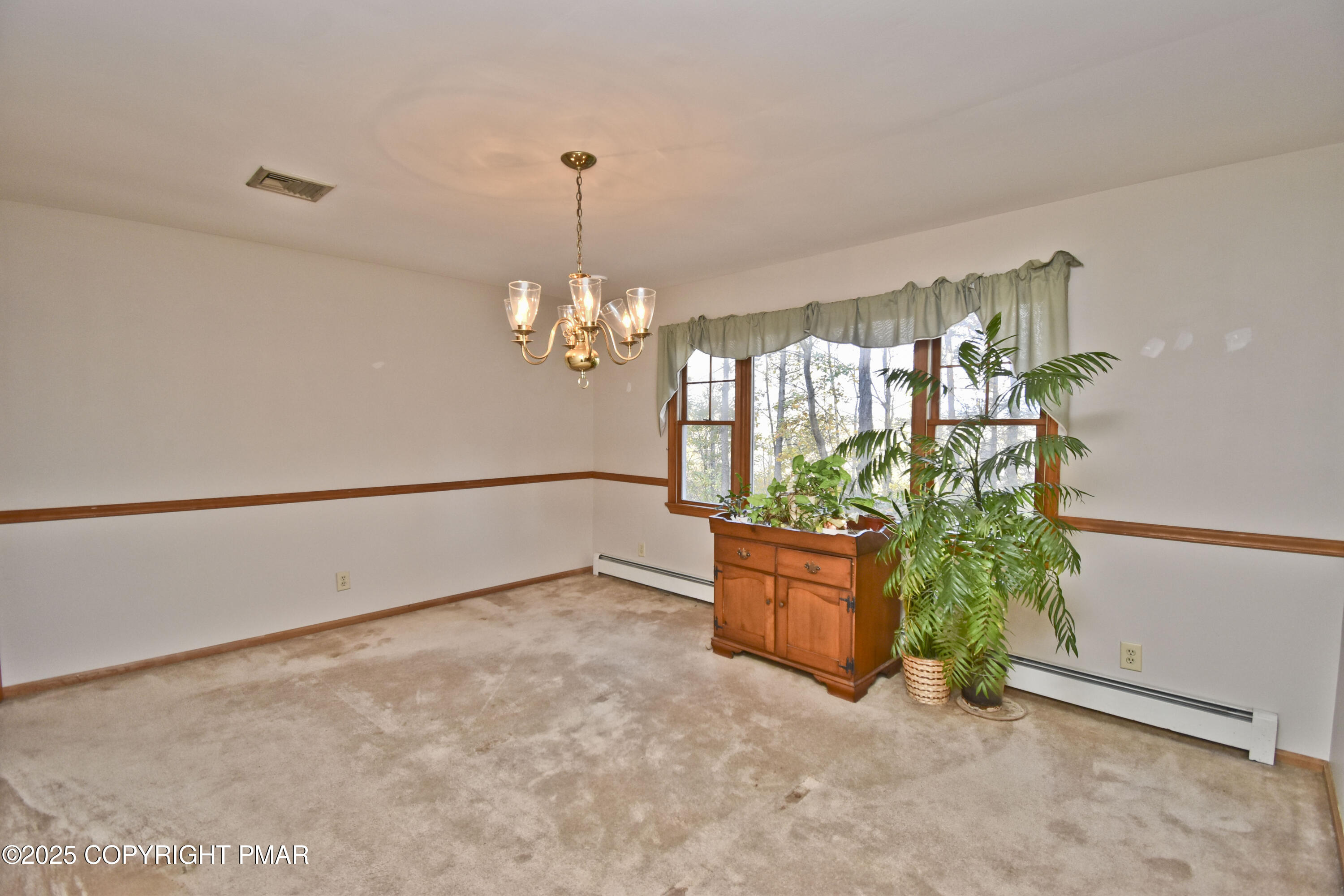 5294 Cherry Valley Road Saylorsburg, PA 18353 - Photo 18 of 53 a view of a chandelier in a room