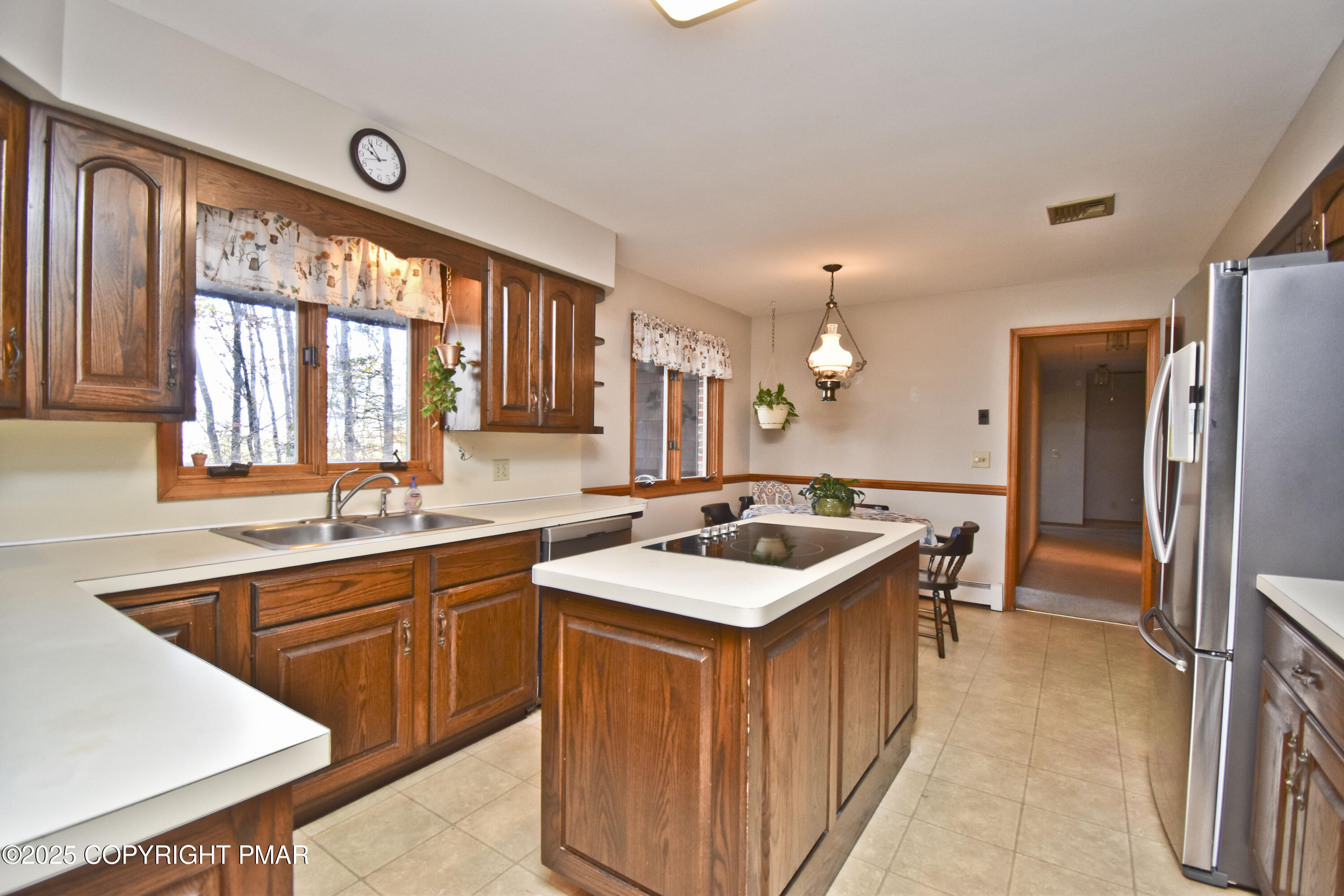 5294 Cherry Valley Road Saylorsburg, PA 18353 - Photo 2 of 53 a kitchen with a sink stove and refrigerator