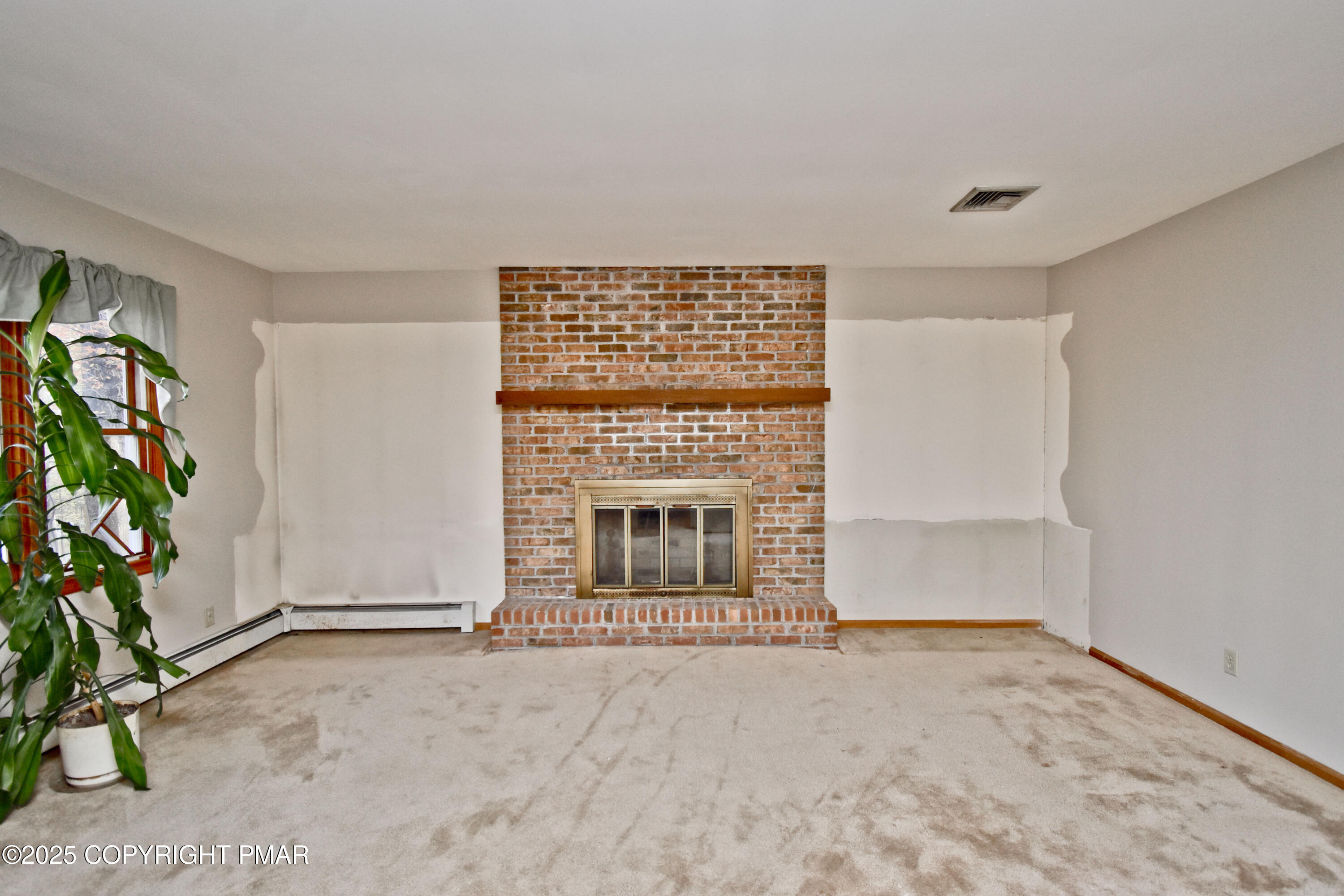5294 Cherry Valley Road Saylorsburg, PA 18353 - Photo 23 of 53 a view of an empty room with a window
