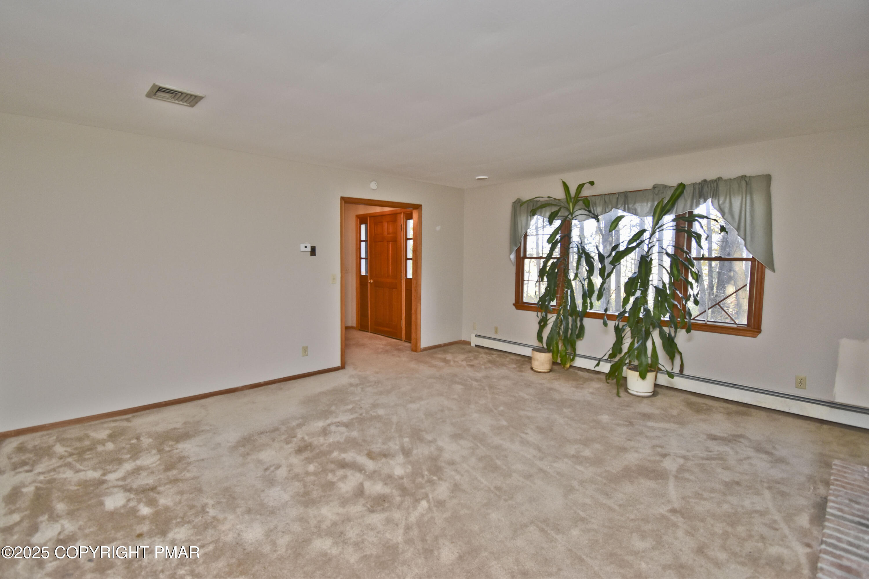 5294 Cherry Valley Road Saylorsburg, PA 18353 - Photo 25 of 53 an empty room with windows