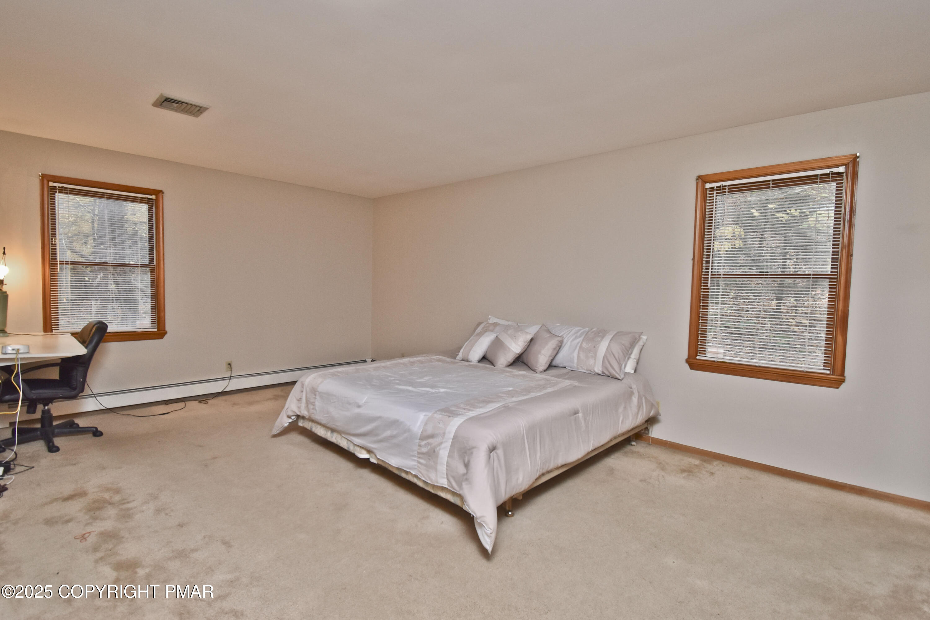 5294 Cherry Valley Road Saylorsburg, PA 18353 - Photo 26 of 53 a bedroom with a bed and a window