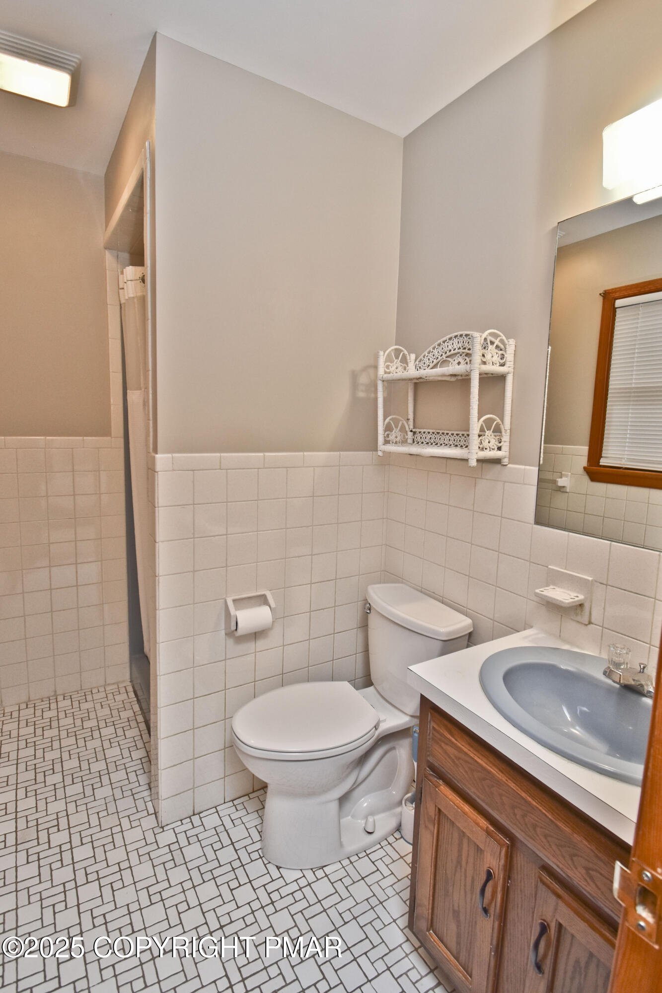 5294 Cherry Valley Road Saylorsburg, PA 18353 - Photo 29 of 53 a bathroom with a sink a toilet and a mirror