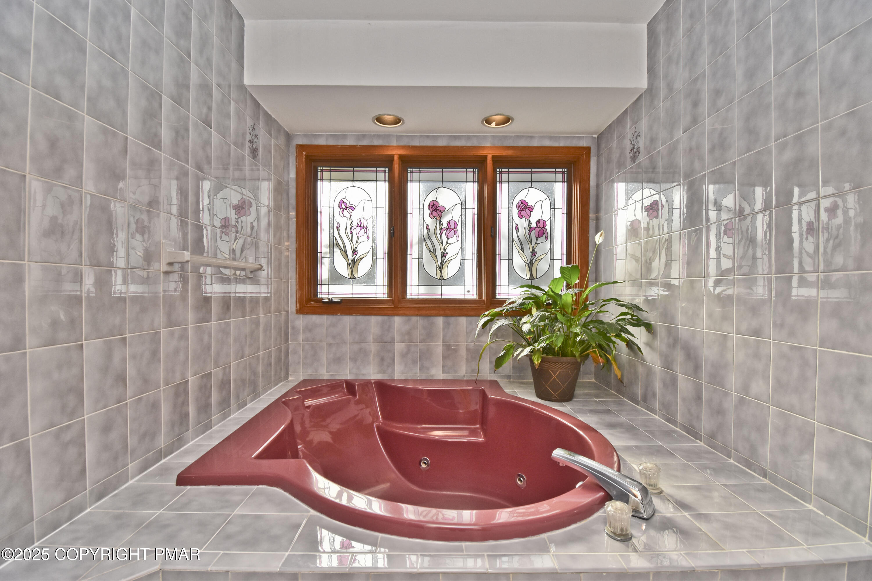 5294 Cherry Valley Road Saylorsburg, PA 18353 - Photo 31 of 53 a bath tub sitting in a bathroom next to a window