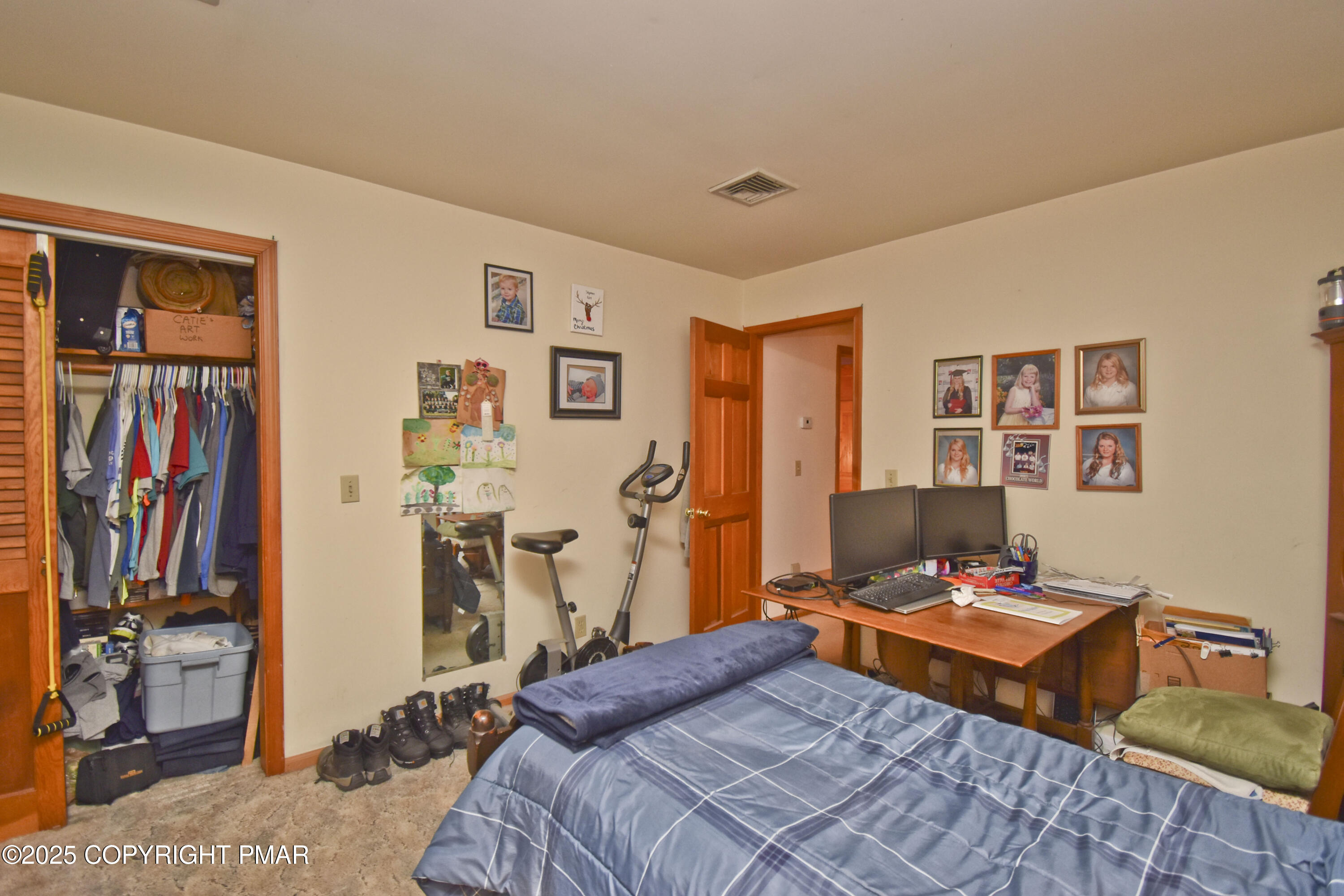 5294 Cherry Valley Road Saylorsburg, PA 18353 - Photo 37 of 53 a bedroom with a bed and a desk