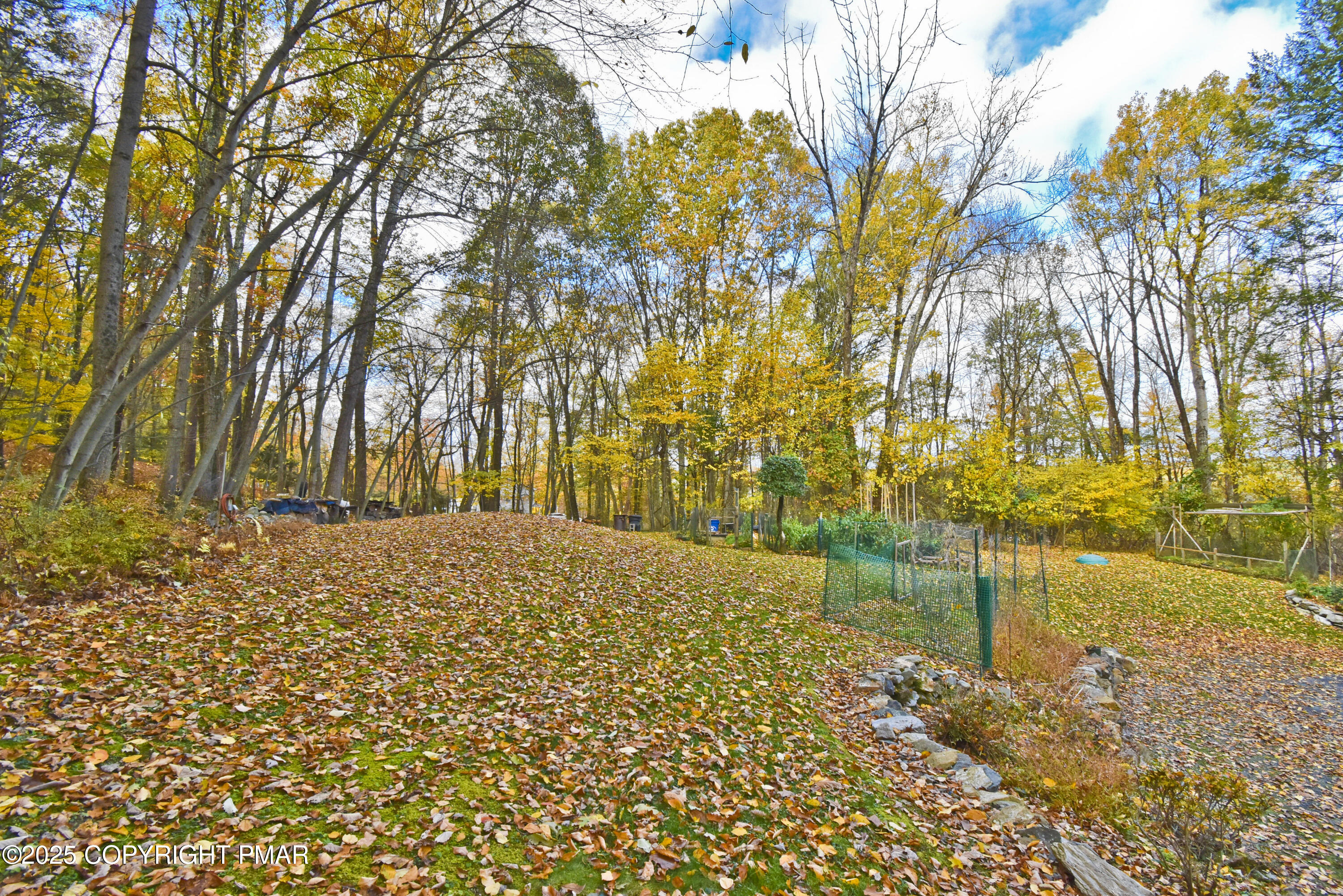 5294 Cherry Valley Road Saylorsburg, PA 18353 - Photo 39 of 53 a backyard of a house with large trees