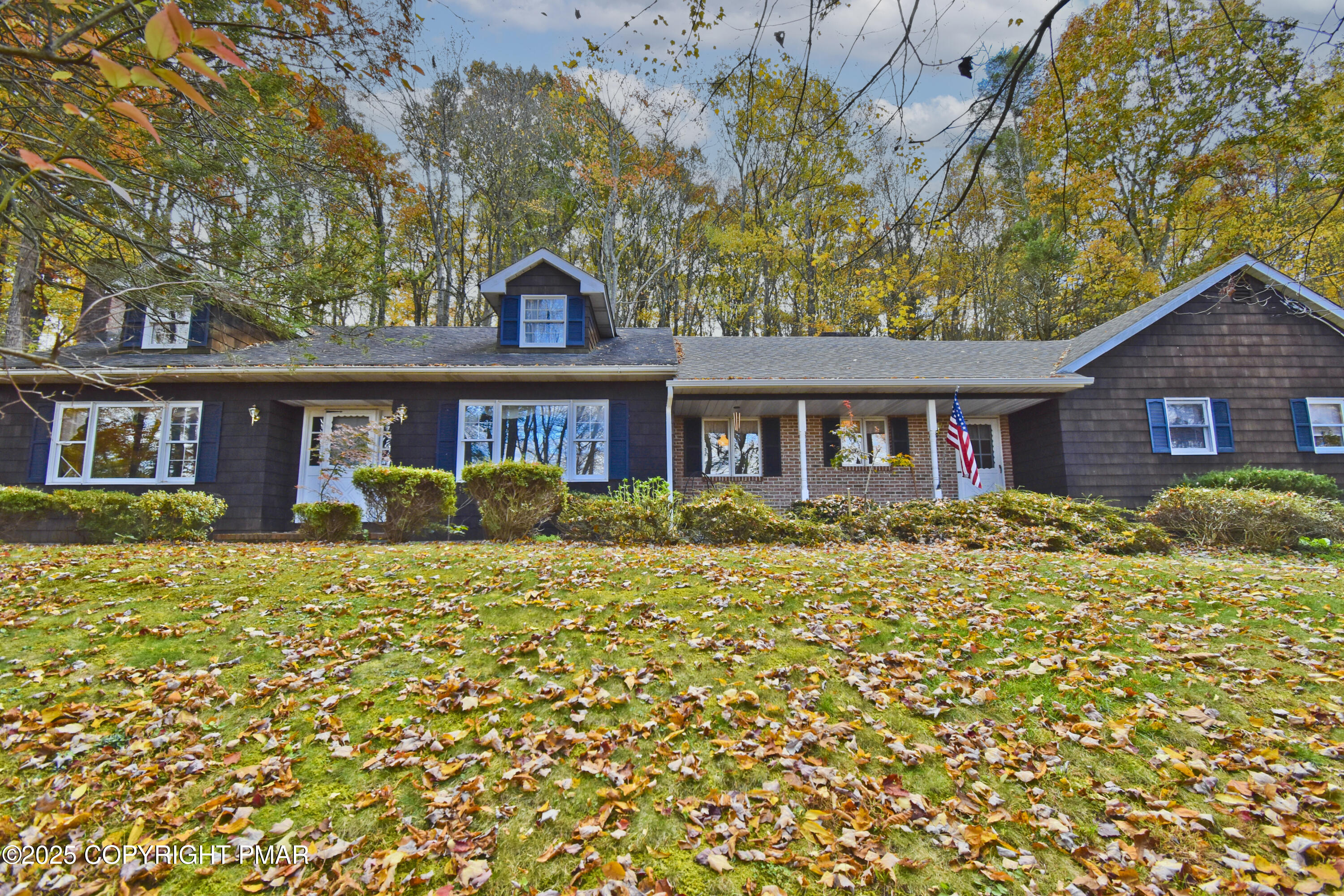 5294 Cherry Valley Road Saylorsburg, PA 18353 - Photo 49 of 53 a front view of a house with a yard