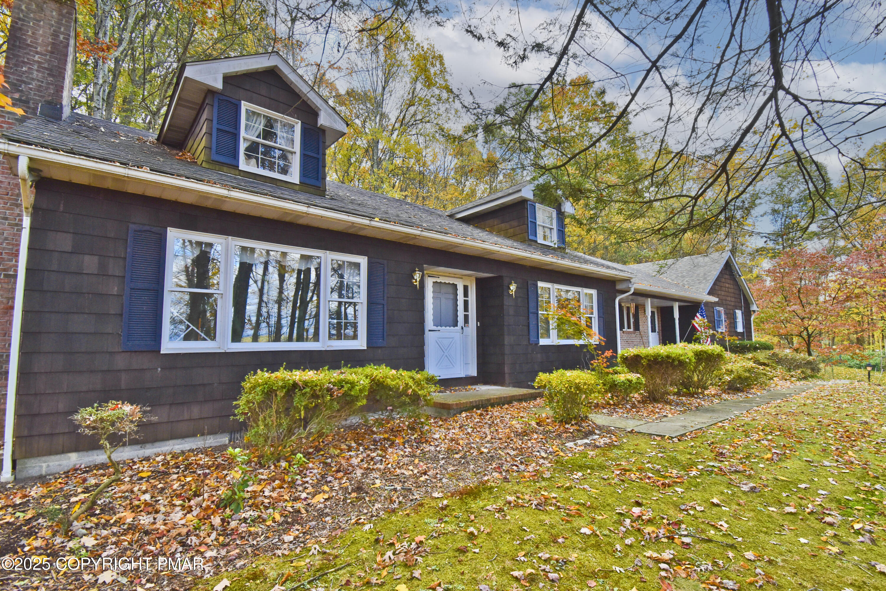 5294 Cherry Valley Road Saylorsburg, PA 18353 - Photo 50 of 53 a front view of a house with a yard