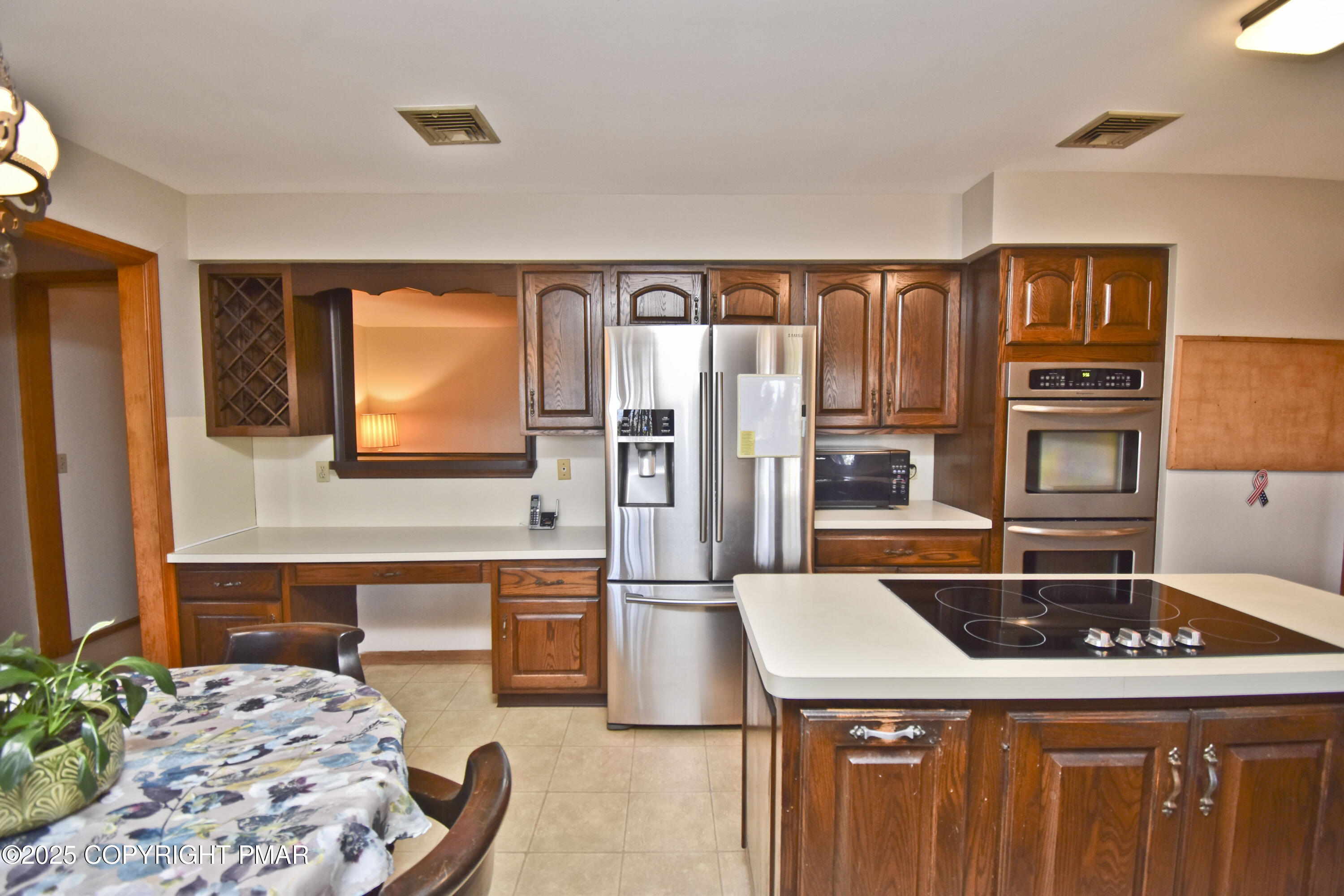 5294 Cherry Valley Road Saylorsburg, PA 18353 - Photo 7 of 53 a kitchen with a stove a sink and a refrigerator