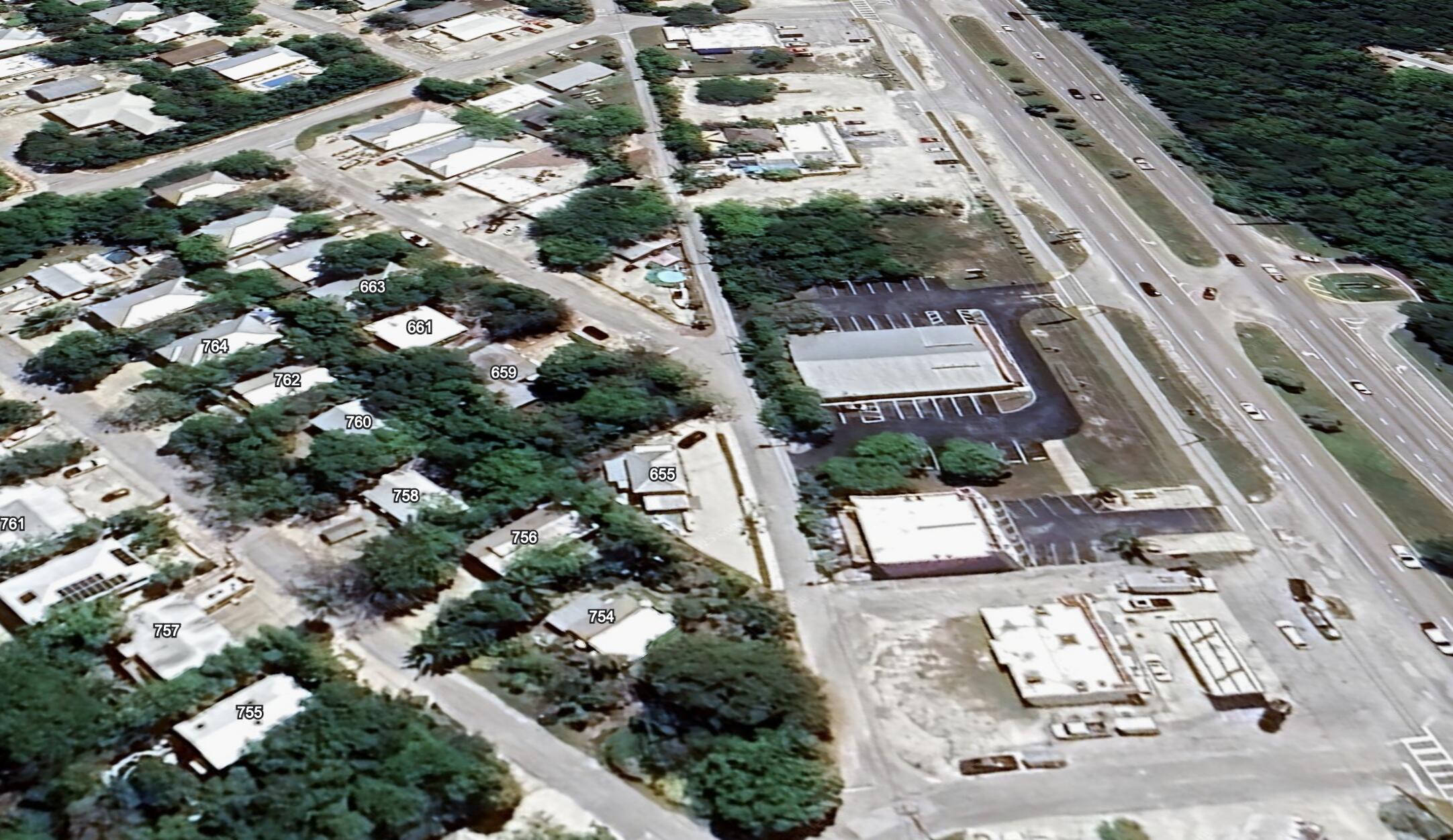 657 Colson Drive Key Largo, FL 33037 - Photo 4 of 5 an aerial view of multi story residential apartment building with parking
