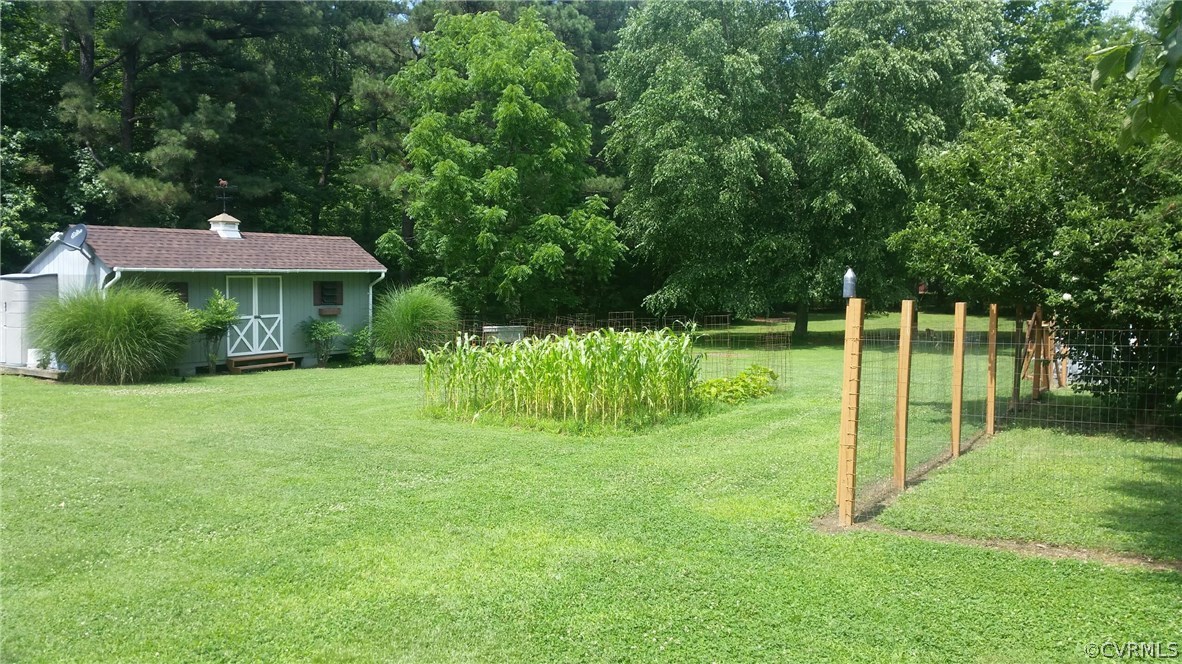 2300 Burgess Road Chester, VA 23836 - Photo 3 of 7 a view of a house with a yard and sitting area