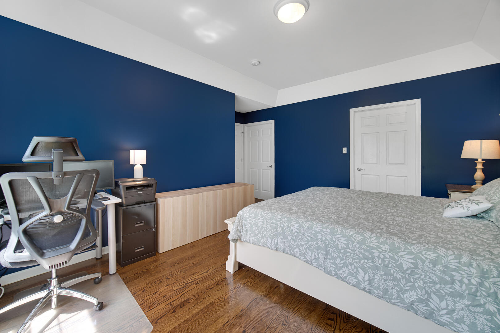 902 Boxwood Drive Munster, IN 46321 - Photo 16 of 23 a bedroom with a bed and a chair